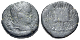 Caracalla (198-217). Mesopotamia. Rhesaena Æ (13,4mm, 3g). Illegible inscription, laureate head right, supported by eagle. R/ L[EG]-III to left and ri...