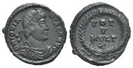 Jovian (363-364). Æ (21mm, 2.85g, 6h). Siscia. Draped and cuirassed bust r. with pearl-diadem. R/ Laurel wreath enclosing VOT/V/MVLT/X; ASISC. RIC VII...