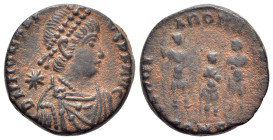 Honorius (393-423). Æ (14.5mm, 2.07g, 6h). Constantinople. Pearl-diademed, draped and cuirassed bust r.; star behind. R/ Arcadius, Honorius and Theodo...