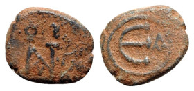 Justin II (565-578). Æ 5 Nummi (16mm, 2.81g, 6h). Constantinople. Monogram. R/ Large Є; A to r. MIBE 45; DOC 60a; Sear 363. Brown patina, near VF