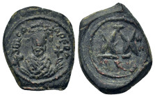 Phocas (602-610). Æ 20 Nummi (18,5mm, 4,5g). Nicomedia, AD 605-606. d m FOCA PER AVG, crowned bust facing, wearing consular robes, holding mappa and c...