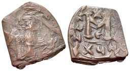 Constans II (641-668). Æ 40 Nummi (20mm, 3.32g, 1h). Constantinople. Constans standing facing, holding long cross and globus cruciger. R/ Large M; sta...