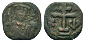 Alexius I Comnenus (1081-1118). Æ Tetarteron (13,7mm 1,70g). Uncertain mint in Greece. Obv: Patriarchal cross set upon base; A - A / K - Φ across fiel...