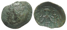 Andronicus II Palaeologus (1282-1328). Æ Trachy (19mm, 0.85g, 6h). Thessalonicat. Patriarchal cross; star to lower l. and r. R/ Andronicus standing fa...