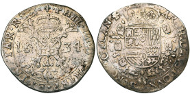 VLAANDEREN, Graafschap, Philips IV (1621-1665), AR patagon, 1634, Brugge. Vz/ Gekroond stokkenkruis met een vuurijzer tussen het jaartal en het juweel...