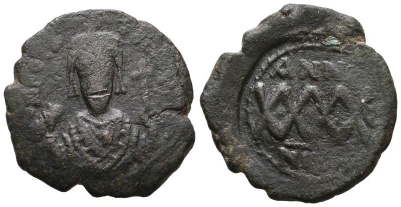 Phocas (602-610 AD). Nicomedia. DAted year 4 = AD 605/6.
AE Follis
Obv: D M FO...