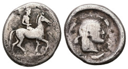 Sicily, Syracuse. Hieron I. 478-466 BC. AR Didrachm, 7.91 g 21.54 mm. Struck circa 478-475 BC. 
Obv: Nude horseman riding right 
Rev: Head of Arethusa...