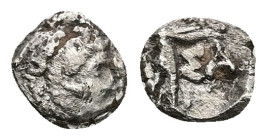 Seleukid Kingdom, Seleukos I Nikator (?),AR Obol, 0.34 g 7.79 mm. 312-281 BC. Perhaps Seleukeia on the Tigris I, circa 296/5 or later. 
Obv: Head of H...