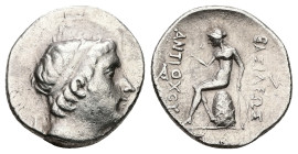Seleukid Kingdom. Antiochos II Theos. AR Drachm, 4.03 g 18.58 mm. 261–246 BC. Tralles (?).
Obv: Diademed head right.
Rev: BAΣIΛEΩΣ ANTIOXOY. Apollo se...