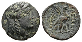 Seleukid Kingdom, Achaios. Ae, 4.15 g 19.38 mm. Usurper, 220-214 BC. Sardes.
Obv: Laureate head of Apollo right.
Rev: BAΣIΛEΩΣ / AXAIOY. Eagle standin...