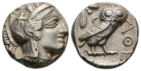 Attica, Athens. AR Tetradrachm, 17.07 g 23.58 mm. Circa 454-404 BC.
Obv: Helmeted head of Athena right, with frontal eye.
Rev: AΘE, Owl standing right...