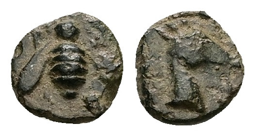 Ionia, Ephesos.Ae, 0.43 g 8.03 mm. Circa 405-390 BC.
Obv: Bee
Rev: Head of stag ...