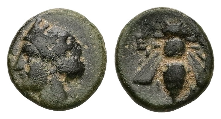 Ionia, Ephesos. Ae, 1.17 g 10.82 mm. Circa 375-325 BC.
Obv: Female head left, we...