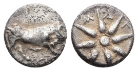 Ionia, Magnesia ad Maeandrum. AR Hemiobol, 0.30 g 6.46 mm. Circa 400-350 BC. 
Obv: Bull butting to right; below, maeander pattern. 
Rev: Μ-Α-Γ Eight-r...
