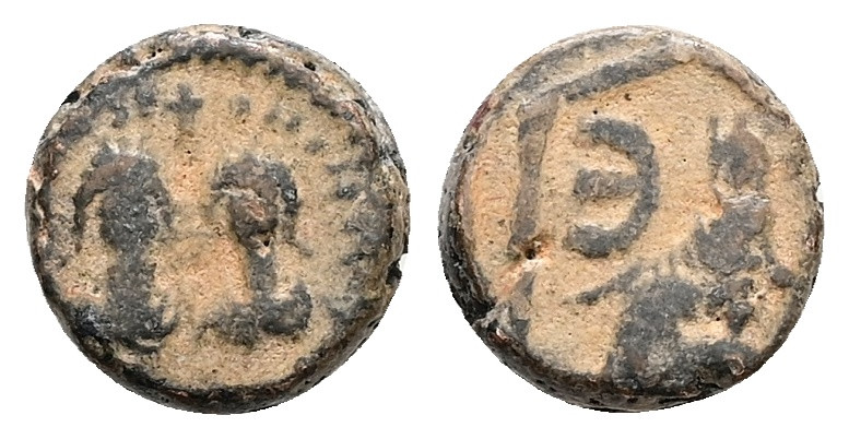 Justin I and Justinian I, AD 527. AE, Pentanummium. 2.41 g. 11.26 mm. Antioch.
O...