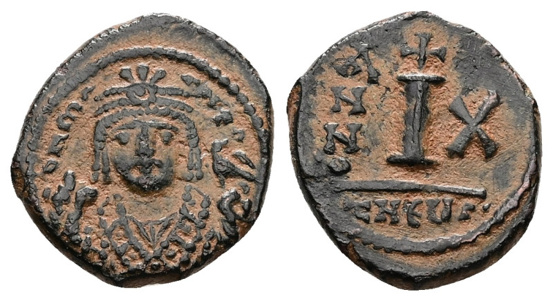 Maurice Tiberius, AD 582-602. AE, Decanummium. 3.44 g. 18.23 mm. Theoupolis (Ant...