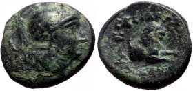Kings of Thrace, Lysimachia AE (Bronze, 2.22g, 14mm) Lysimachos 305-281 BC
Obv: Helmeted head of Athena right 
Rev: BAΣIΛEΩΣ [ΛYΣIMAXOY]; forepart of ...