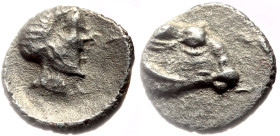 Troas, Kebren AR Tetartemorion (Silver, 0.33g, 7mm) 4th century BC
Obv: Head of Apollo right.
Rev: Head of ram right.
Ref: BMC 14