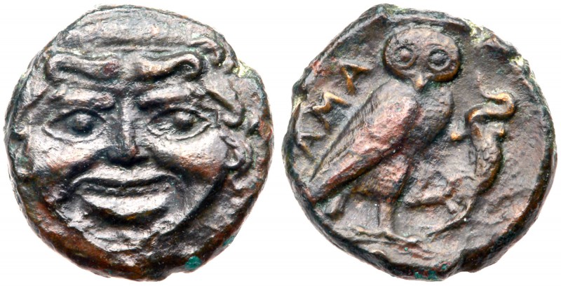 Sicily, Kamarina. &AElig; Onkia (1.44 g), ca. 420-405 BC. Gorgoneion facing. Rev...