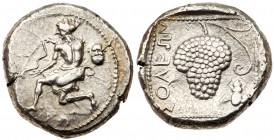 Cilicia, Soloi. Silver Stater (10.62 g), ca. 440-410 BC. Amazon kneeling left, holding bow; to right, head of satyr facing. Reverse: Grape bunch on vi...