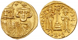 Constans II. Gold Solidus (4.32 g), 641-668. Constantinople, 662-667. Draped busts of Constans, on left, wearing long beard and plumed helm, and Const...