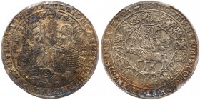 German States: Saxe-Coburg-Gotha. Taler, 1615. Dav-7429. Johann Casimir and Johann Ernst II, 1572-1633. Facing busts. Reverse ; Sixteen shields around...