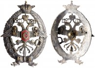 Russian Badge Commemorating the 100th Anniversary of Local Troops. Handsome silver wreath of oak and palm branches bound by a silver ribbon with the l...