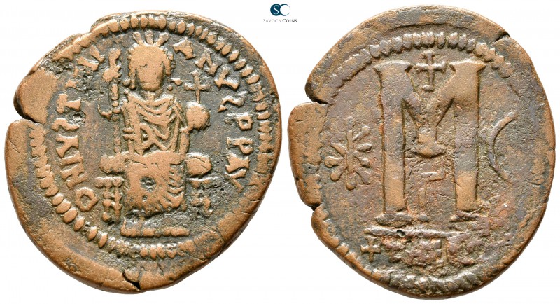 Justinian I AD 527-565. Theoupolis (Antioch)
Follis Æ

35 mm., 16,37 g.


...