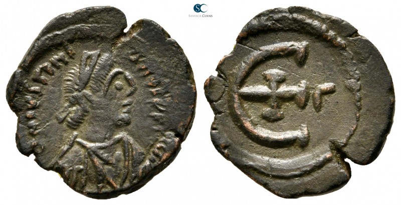 Justinian I AD 527-565. Theoupolis (Antioch)
Pentanummium Æ

17 mm., 1,89 g....