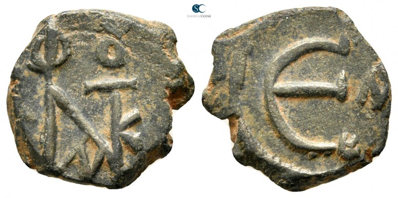 Justin II AD 565-578. Constantinople
Pentanummium Æ

16 mm., 1,94 g.



v...
