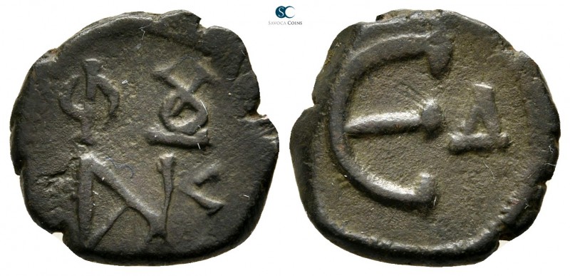 Justin II AD 565-578. Constantinople
Pentanummium Æ

15 mm., 2,36 g.



v...