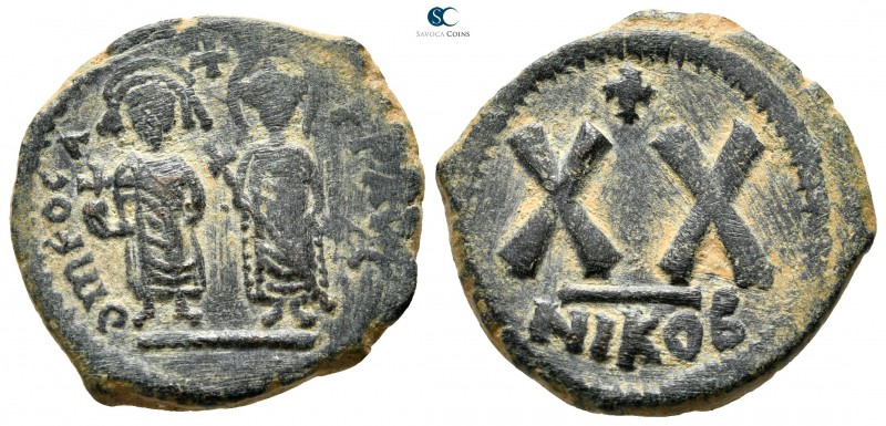 Phocas, with Leontia AD 602-610. Nikomedia
Half follis Æ

23 mm., 6,04 g.

...