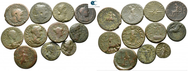 Lot of ca. 11 roman provincial bronze coins / SOLD AS SEEN, NO RETURN!

nearly...