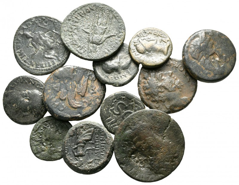 Lot of ca. 12 roman provincial bronze coins / SOLD AS SEEN, NO RETURN!

nearly...