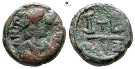 Justinian I AD 527-565. Alexandria. 12 Nummi Æ
