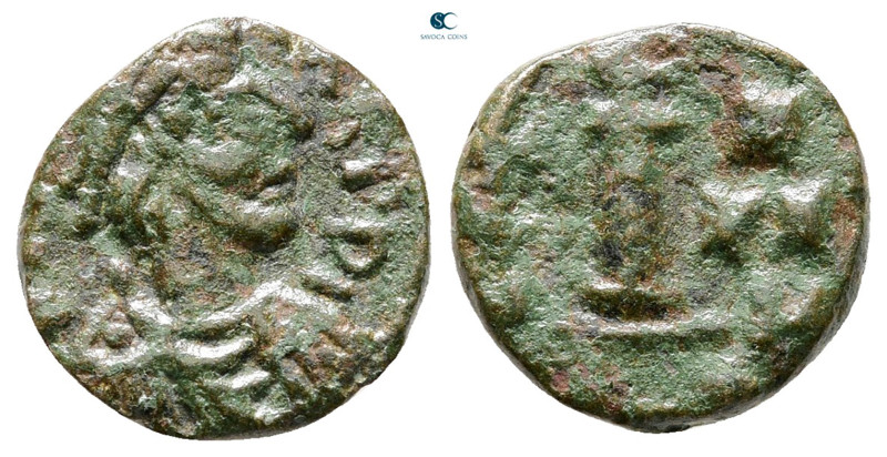 Justinian I AD 527-565. Constantinople
Decanummium Æ

13 mm, 1,97 g



Go...