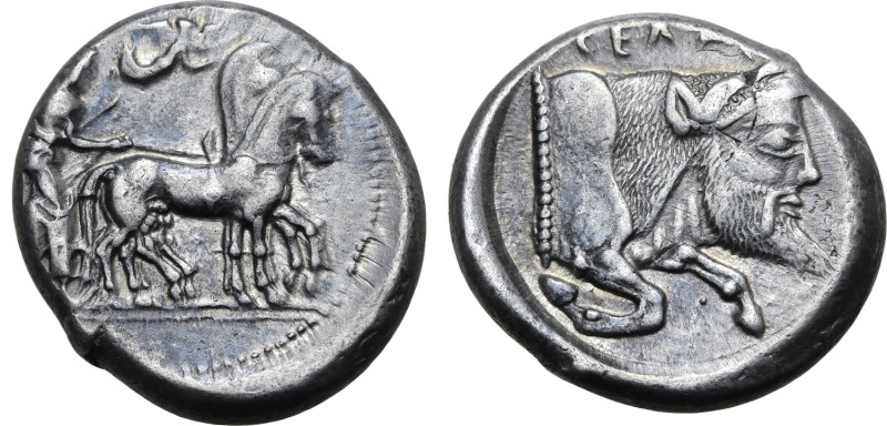 No Reserve 

Sicily, Gela AR Tetradrachm. Circa 480-470 BC. Charioteer, holding ...
