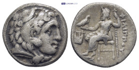 MACEDON. Kingdom of Macedon. Philip III, 323-317 B.C. AR Drachm, Colophon (4 Gr. 17mm.)
 Head of Heracles facing right wearing lion's scalp 
Rev. Zeus...