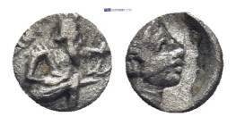 PERSIA. Achaemenid Empire. temp. Artaxerxes III to Darios III. (4th century BC.) AR Tetartemorion. 
(0.12 Gr. 5mm.)
The Persian Great King in kneeling...