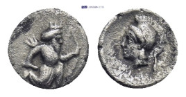 CILICIA. Uncertain. 4th century BC. AR Tetartemorion (0.19 Gr. 6mm.). 
Persian king in kneeling-running stance right, holding dagger and bow 
Rev. Hel...