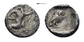 CILICIA, Uncertain. 4th century BC. AR Tetartemorion (0.14 Gr. 5mm).
 Persian king or hero, wearing kidaris and kandys , in kneeling-running stance ri...