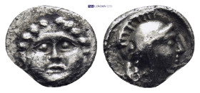 Pisidia. Selge circa 350-300 BC. Obol AR (0.86 Gr. 11mm.) 
Gorgoneion. 
Rev. Head of Athena to right, wearing crested Attic helmet; behind, astragalos...