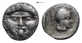 Pisidia, Selge. civic issue. Ca. 350-300 B.C. AR obol (0.9 Gr. 10mm.). 
Facing Gorgoneion 
Rev. Head of Athena left wearing crested Corinthian style h...