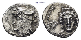 CILICIA, Uncertain. 4th century BC. AR Obol (0.65 Gr. 11mm.) 
Head of Satrap left. 
Rev. Head of female facing slightly left, wearing crown and earrin...
