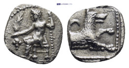 LYCAONIA, Laranda. Circa 324/3 BC. AR Obol (0.54 Gr. 9mm.). 
Baal seated left, torso facing, holding grain ear and grape bunch in extended right hand,...
