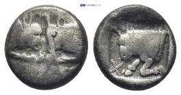 Caria, uncertain AR Diobol. Circa 450-400 BC. (2.07 Gr. 12mm.)
 Confronted foreparts of two bulls 
Rev. Forepart of bull to left, within incuse square...