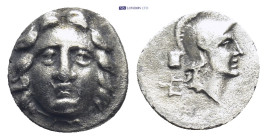 Pisidia. Selge circa 350-300 BC. Obol AR (0.72 Gr. 10mm.) 
Gorgoneion. 
Rev. Head of Athena to right, wearing crested Attic helmet.