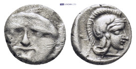 Pisidia. Selge circa 350-300 BC. Obol AR (1 Gr. 9mm.) 
Gorgoneion. 
Rev. Head of Athena to right, wearing crested Attic helmet.