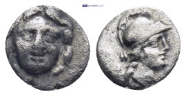 Pisidia. Selge circa 350-300 BC. Obol AR (0.6 Gr. 9mm.) 
Gorgoneion. 
Rev. Head of Athena to right, wearing crested Attic helmet.