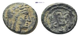 BITHYNIA. Kios. Ae (11mm, 1.35 g) (3rd century BC).
Obv: Head of Mithras right, wearing a laureate tiara.
Rev: K-I. 
Kantharos with two grape vines wi...
